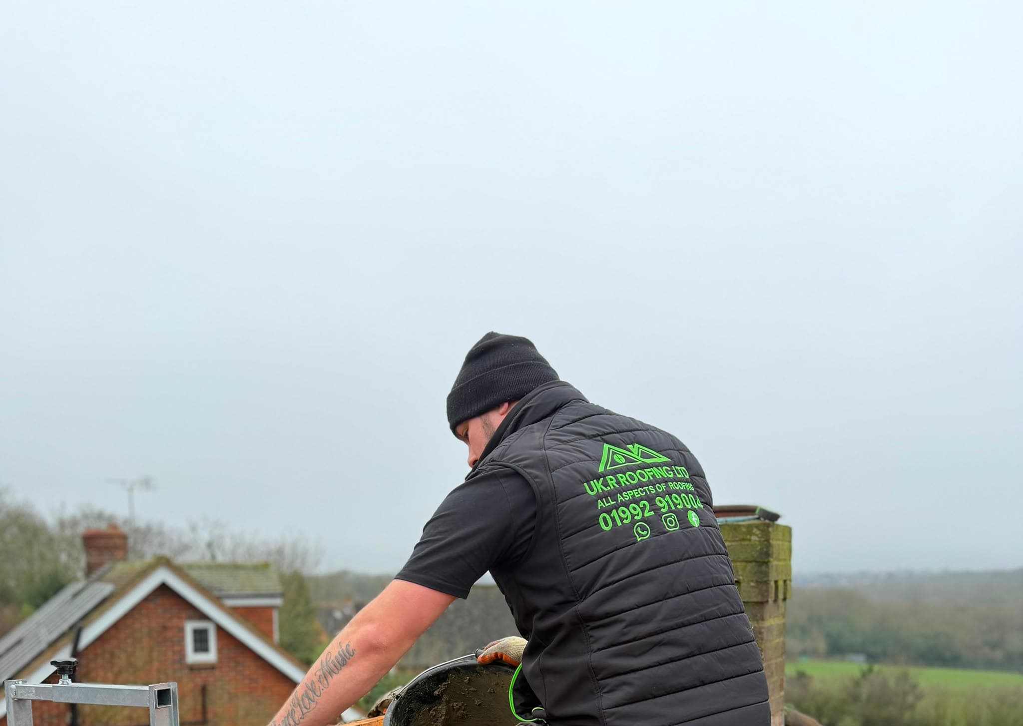 UKR Roofing Ltd roofer at work