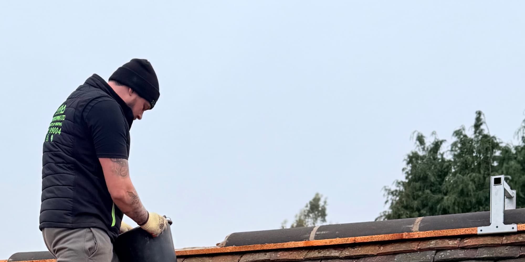 UKR Roofing Ltd roofer at work